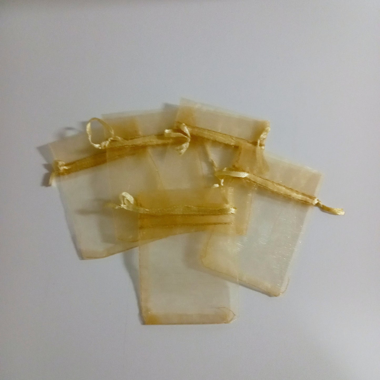 Sacos de organza cor dourada 7*9cm 5UND